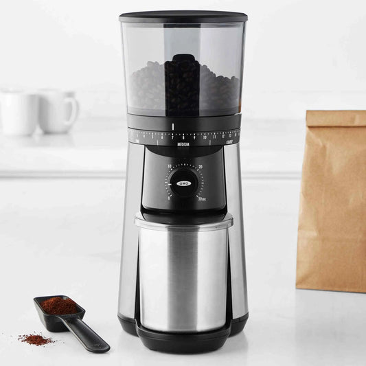 OXO Brew Conical Burr Coffee Grinder with stainless steel burrs and 15 grind settings in UV-blocking hopper