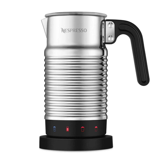 Nespresso Aeroccino 4 silver electric milk frother with ergonomic handle and chrome jug on kitchen counter