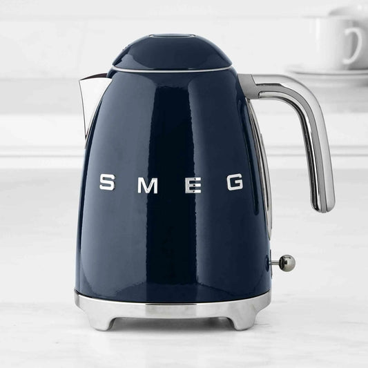 SMEG Electric Kettle with 360° swivel base, auto shut-off, water-level indicators, gentle steam release, and removable limescale filter.