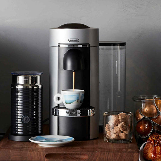 Nespresso VertuoPlus Deluxe Coffee Maker with Aeroccino Milk Frother in sleek chrome design