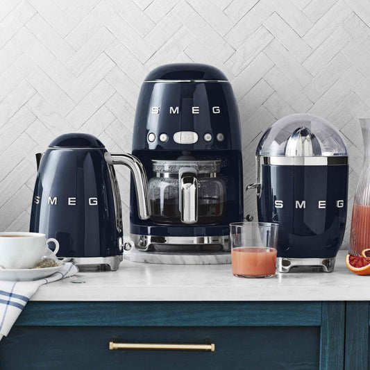 SMEG Electric Kettle with 360˚ swivel base, auto-shutoff, water-level indicators, steam release lid, and removable limescale filter