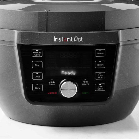 Instant Pot RIO Wide Plus 7.5-qt pressure cooker with wide base, 9-in-1 functions, customizable smart programs, and whisper-quiet steam release.