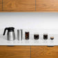 De'Longhi TrueBrew automatic coffee maker with thermal carafe and built-in grinder brewing fresh drip coffee
