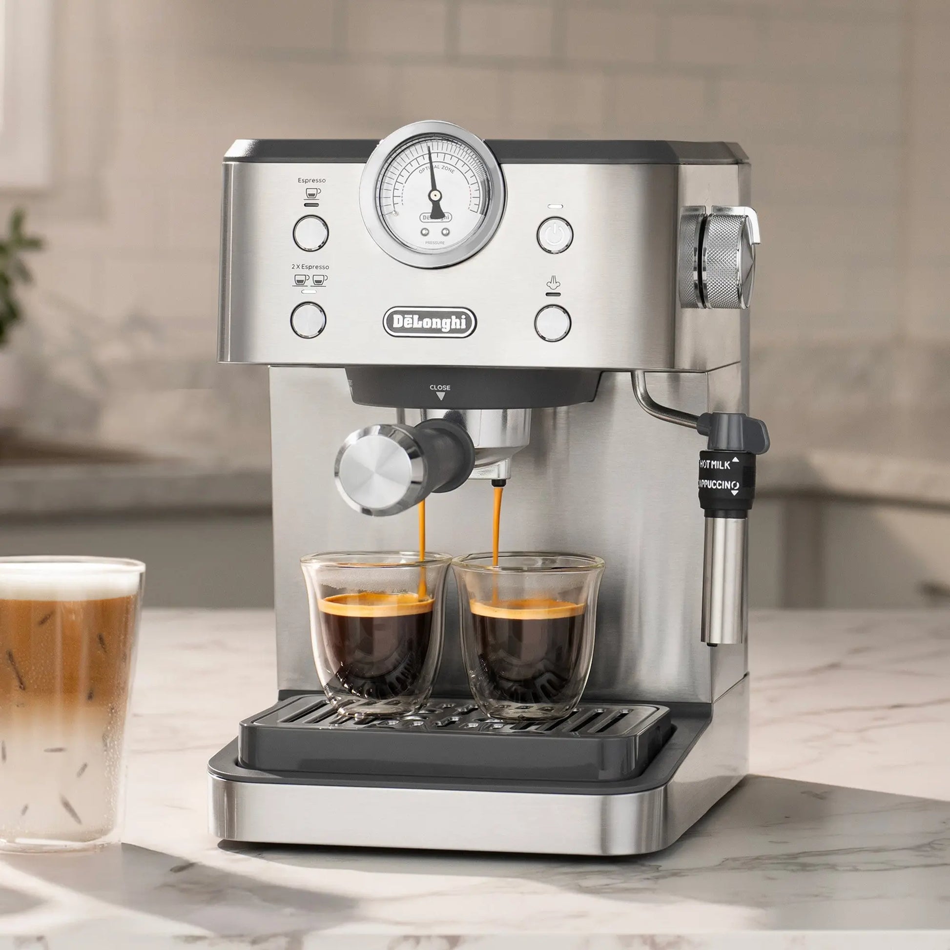 De'Longhi Classic Espresso Machine with 15-bar pump, Thermoblock technology, and chrome pressure gauge in compact stainless steel design