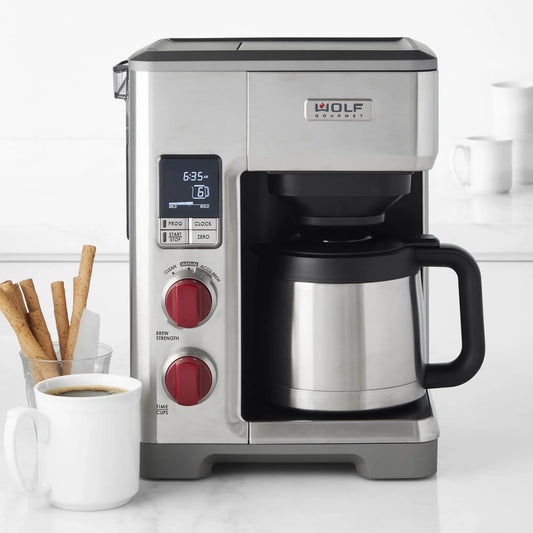 Wolf Gourmet Automatic Drip Coffee Maker with 10-cup capacity, stainless steel finish, and digital control panel.