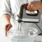 KitchenAid 9-Speed Digital Hand Mixer with Turbo Beater II and soft grip handle on kitchen counter