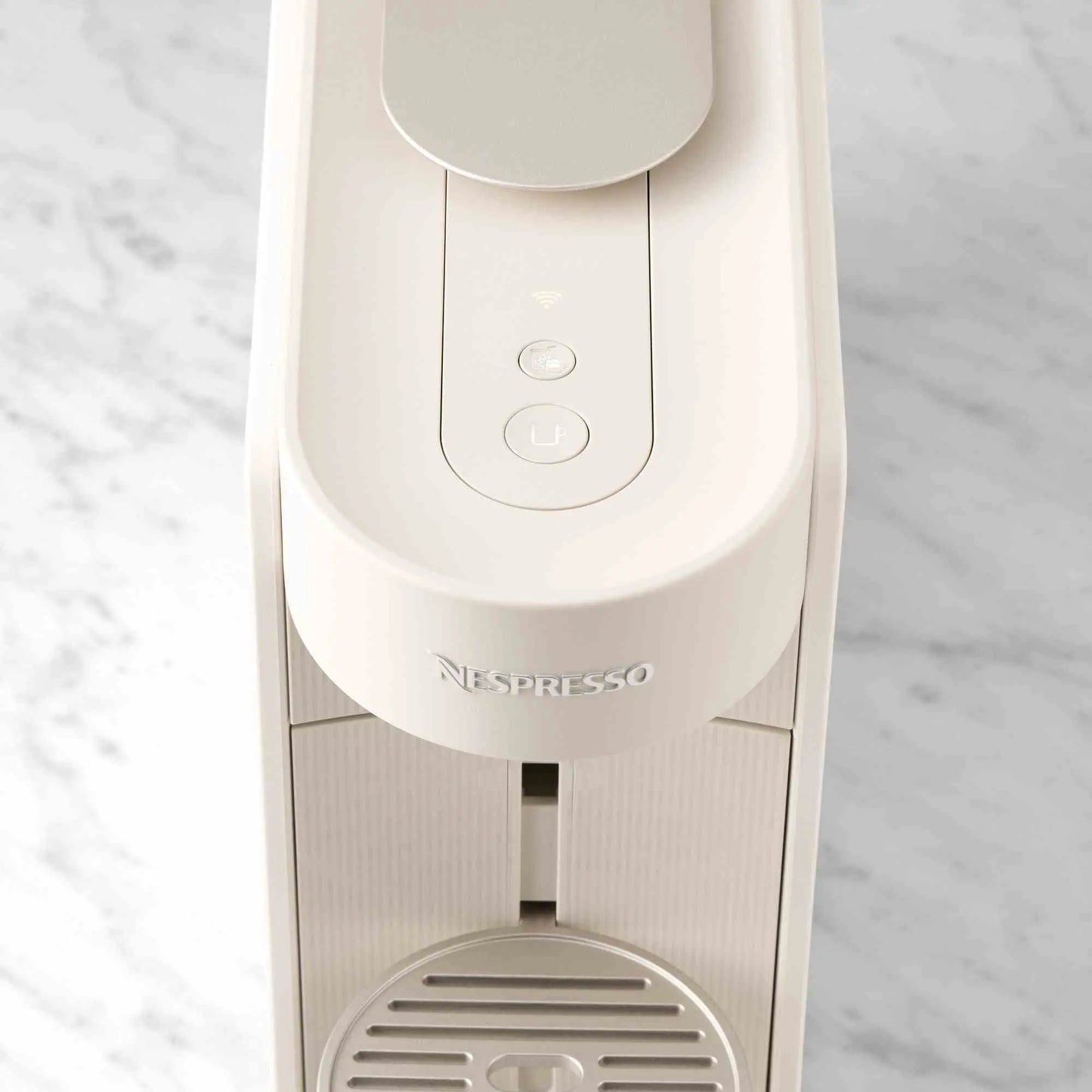 Nespresso Vertuo Up espresso machine by De'Longhi with Aeroccino frother and capsules, sleek design, fast brewing, and barcode capsule recognition