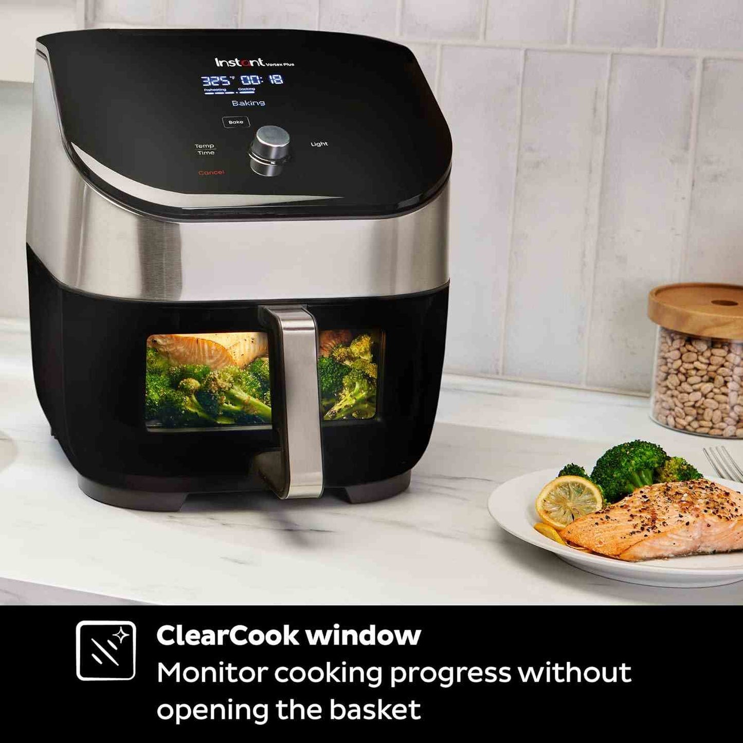 Instant Vortex Plus 6QT Air Fryer with ClearView window and OdorEase filters cooking chicken wings and vegetables
