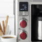 Wolf Gourmet automatic drip coffee maker with 10-cup capacity, sleek black design, and digital control panel.