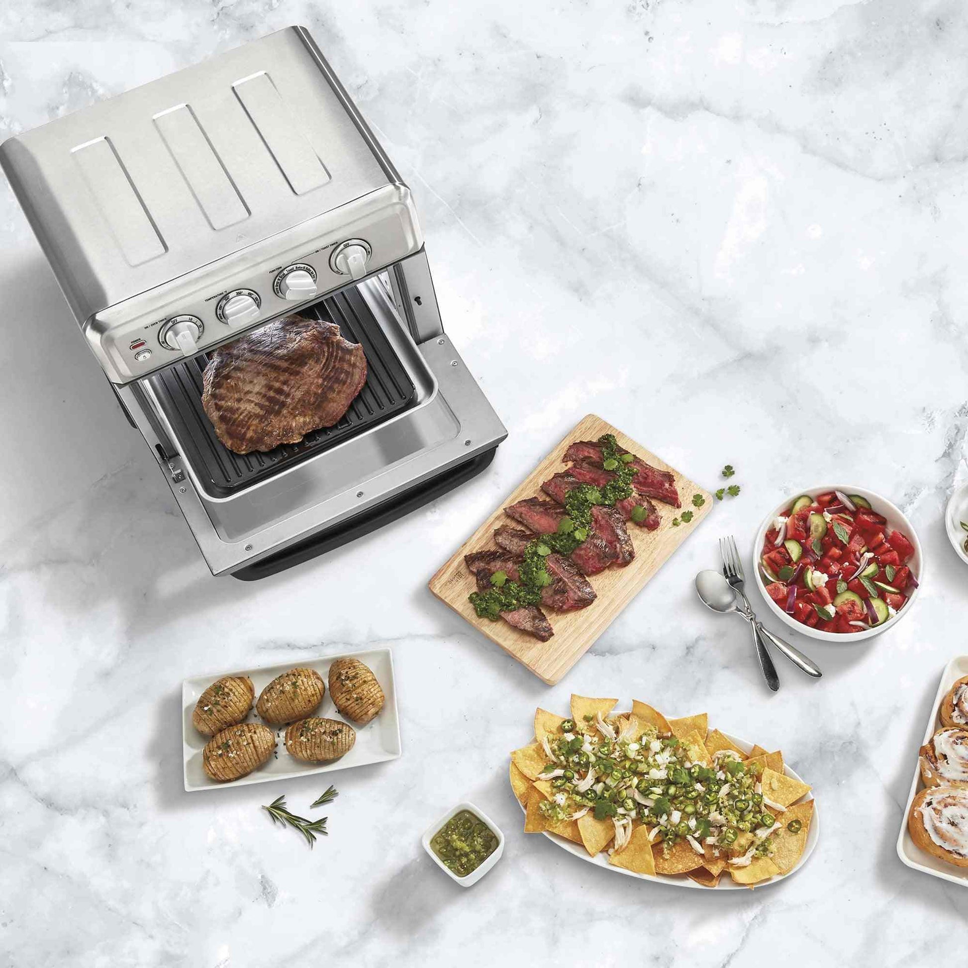 Cuisinart Air Fryer Toaster Oven 7-in-1 stainless steel countertop appliance with air fryer basket and baking pan