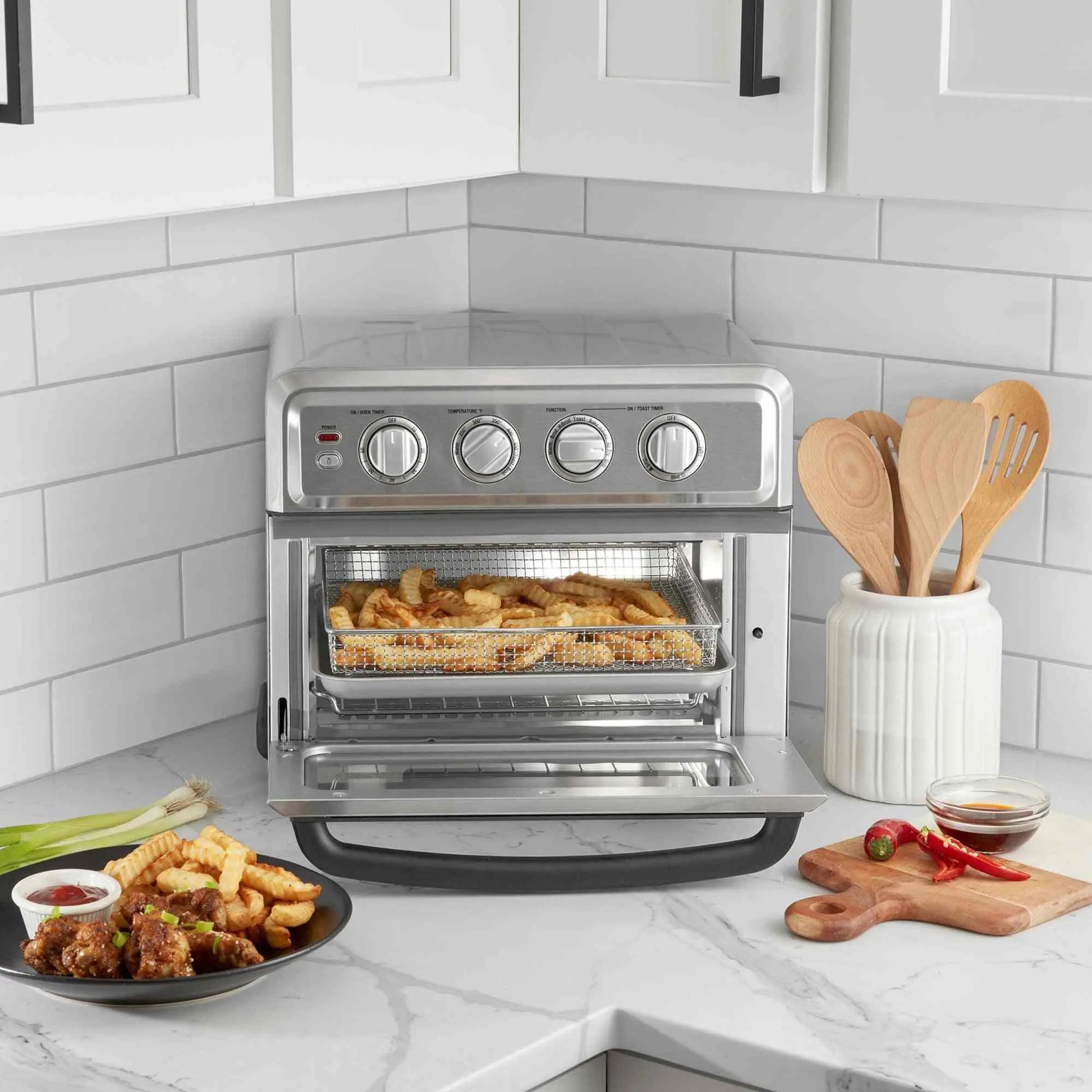 Cuisinart Air Fryer Toaster Oven 7-in-1 stainless steel countertop appliance with air fryer basket and multiple cooking functions