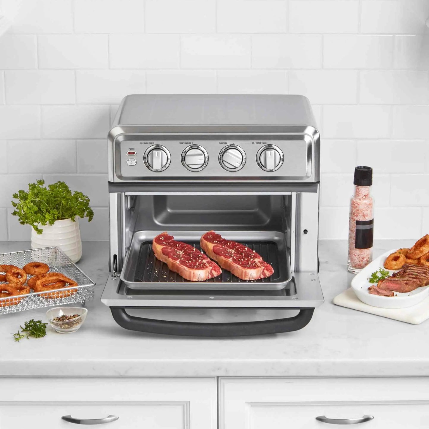Cuisinart Air Fryer Toaster Oven 7-in-1 stainless steel countertop appliance with air fryer basket and baking accessories
